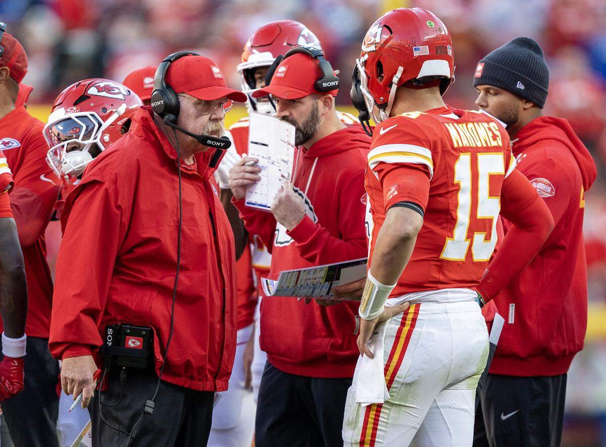 Chiefs head coach Andy Reid, left, goes over some strategy on the sideline with quarterback Patrick Mahomes (No. 15) during a Sunday, Nov. 23, 2025 NFL Week 12 game against the Indianapolis Colts at GEHA Field at Arrowhead Stadium in Kansas City. The Chiefs defeated the Colts 23-20 in overtime.
