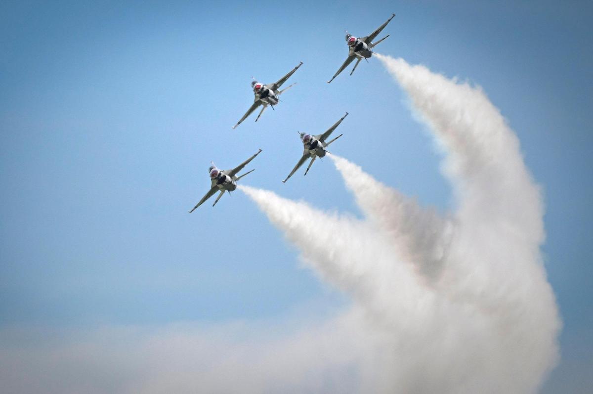 Vapor trails from the U.S. Air Force Thunderbirds as they arrive from Las Vegas at the New Century AirCenter on Thursday, Sept. 1, 2022, in Gardner, Kansas, for the Garmin KC Air Show, which runs Saturday and Sunday.