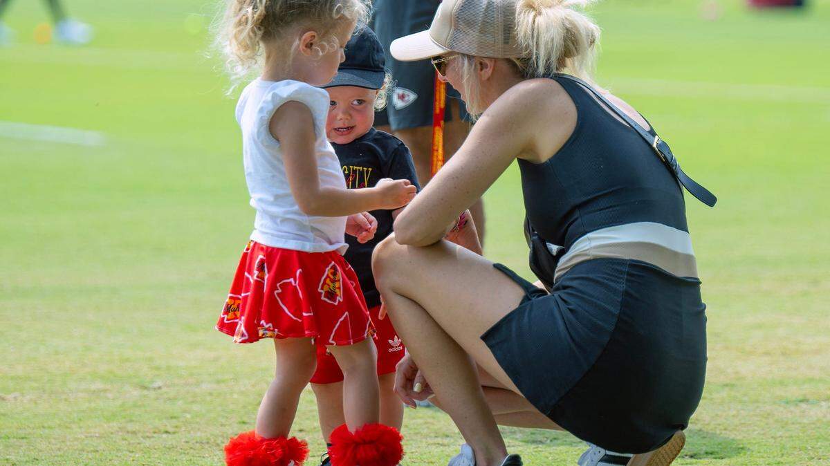 Brittany Mahomes and 3-year-old daughter, Sterling and 1-year-old son Bronze, were on the field near the end of practice on a recent day at Chiefs training camp.