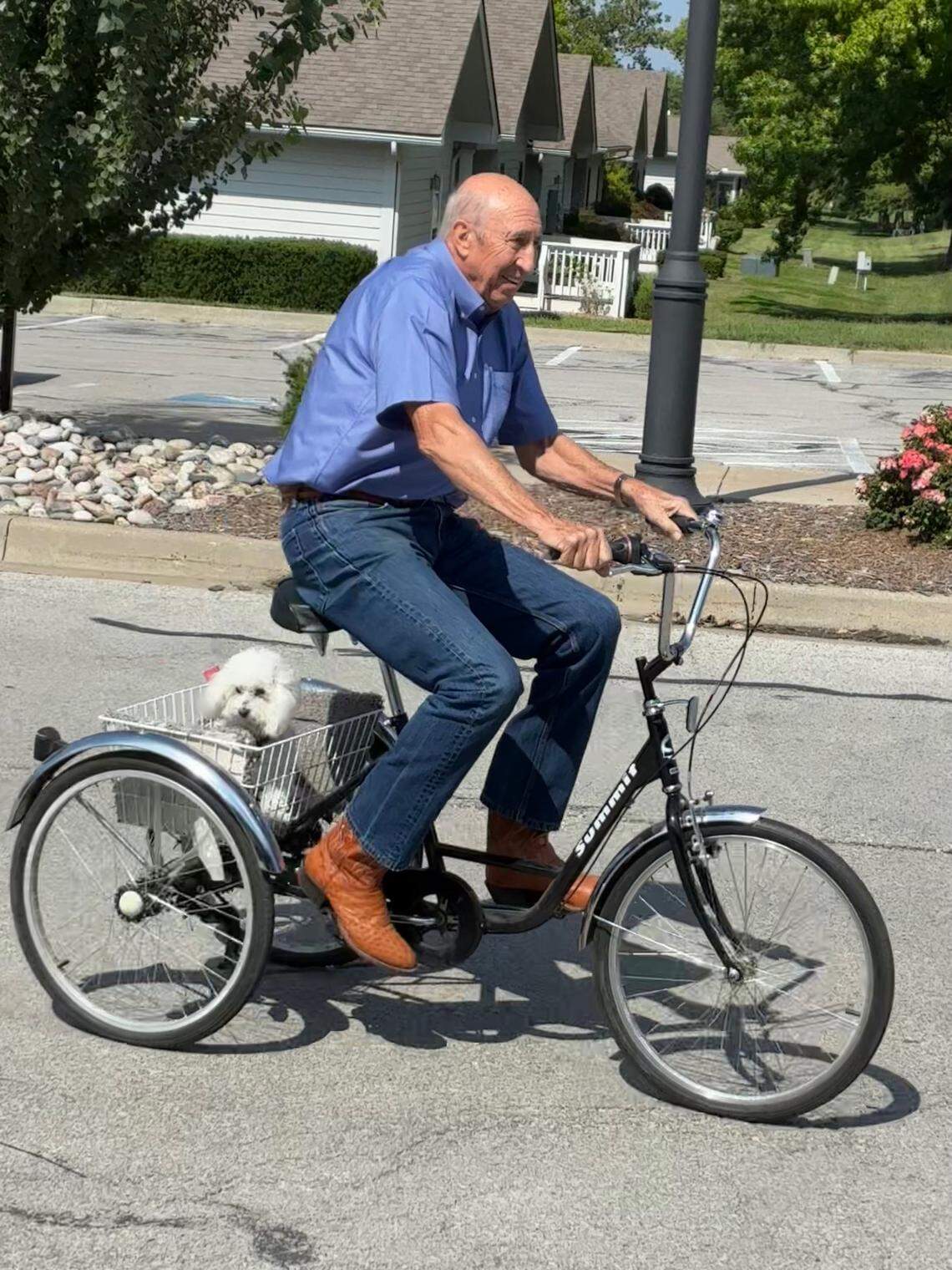 Michael Kenny often takes his therapy dog, Samson, out for bike rides.