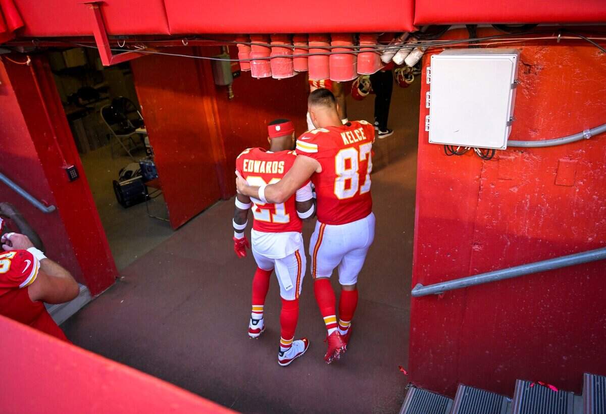Kansas City Chiefs safety Mike Edwards gets a hug from Travis Kelce after the Chiefs defeated the Chicago Bears, 41-10, on Sept. 24, 2023, at Arrowhead Stadium.