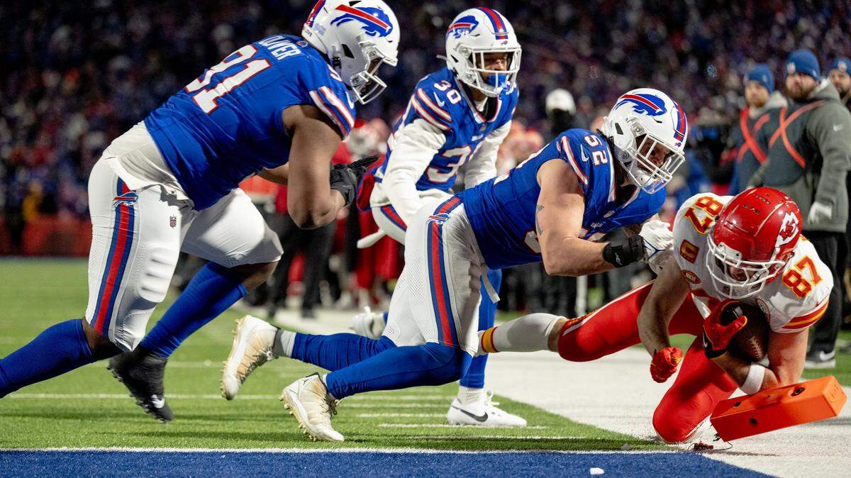 Photo of Travis Kelce scoring a touchdown against the Buffalo Bills