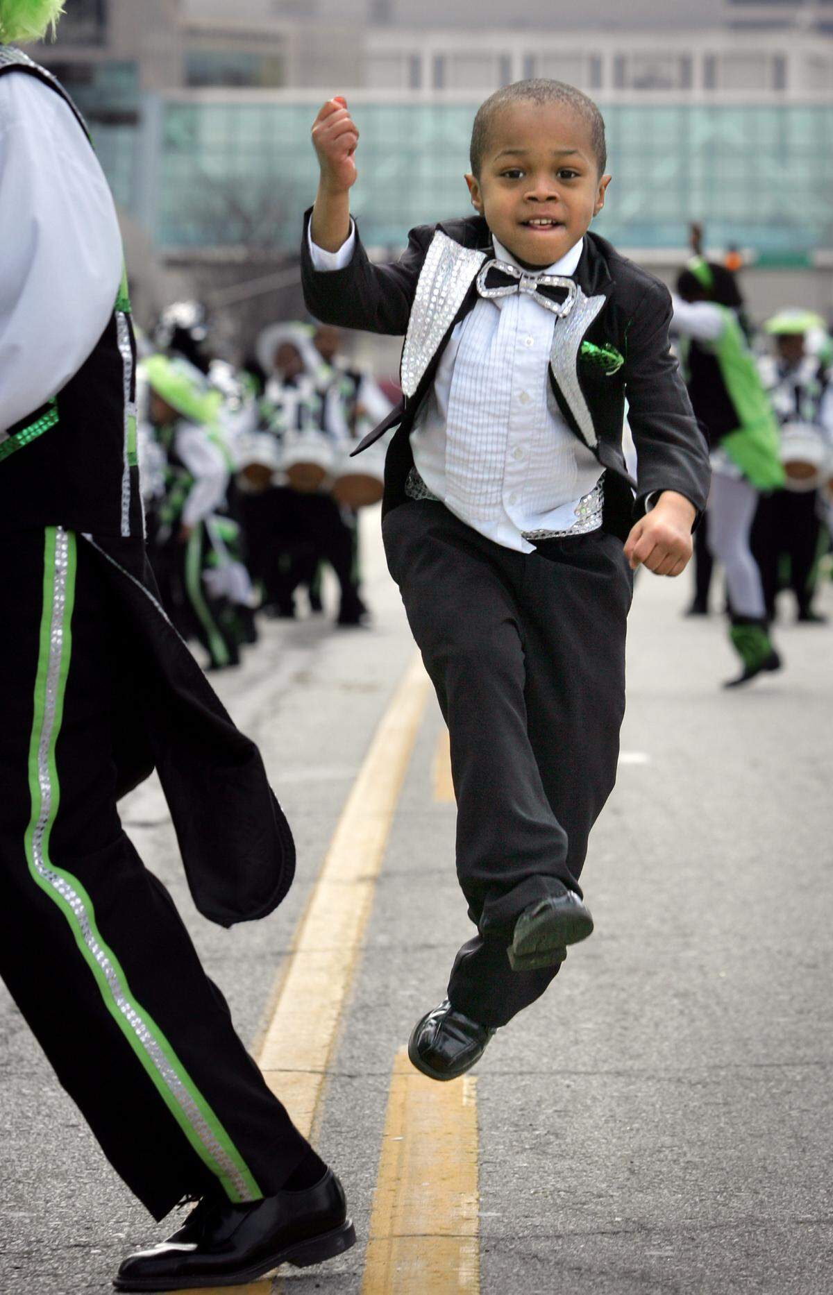Dontayvion Daughtry, 5, performed with the Marching Cobras in 2007 at the St. Patrick’s Day Parade along Grand Blvd. in Kansas City.