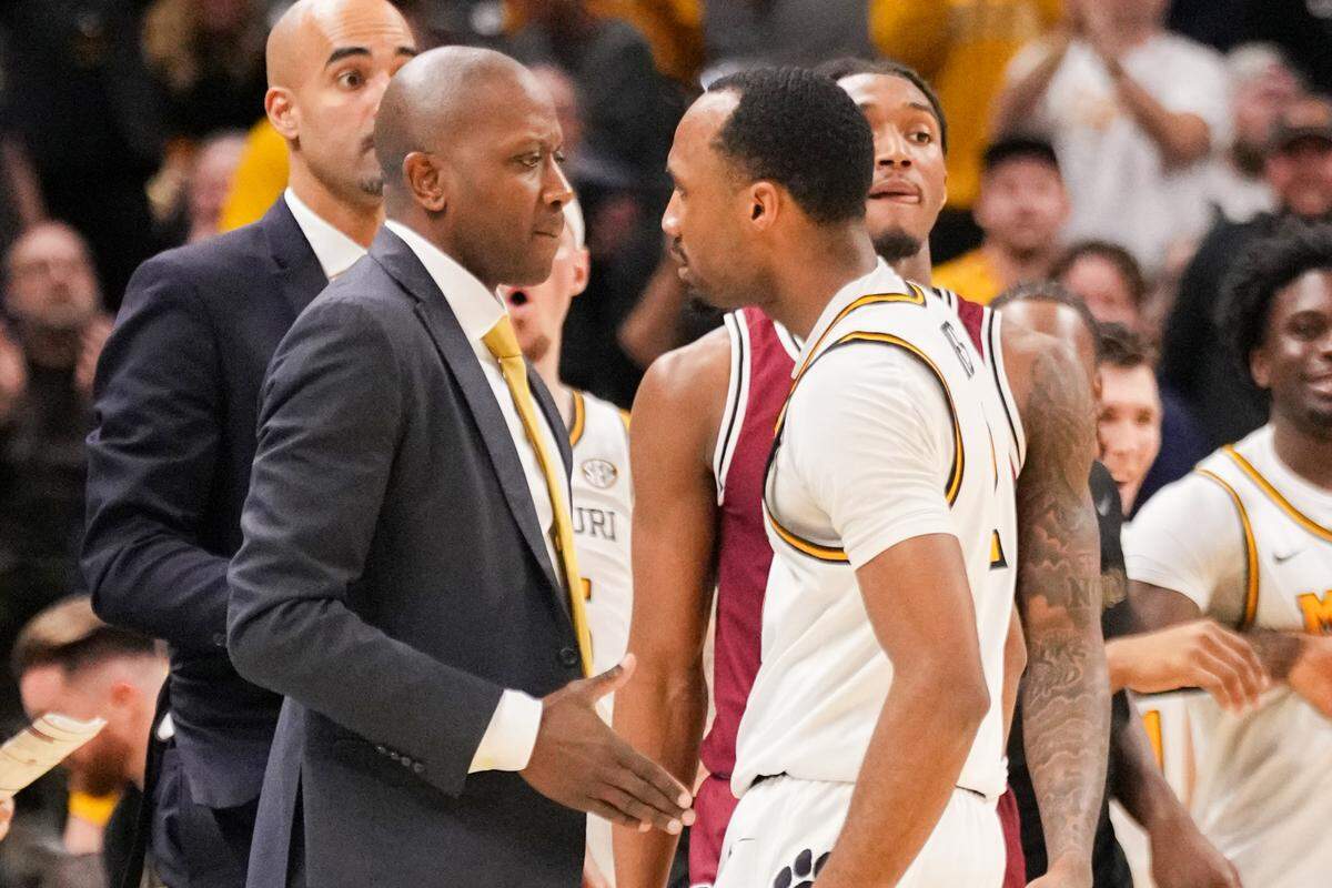 Missouri Tigers men’s basketball coach Dennis Gates, left, found a winner in former standout Indiana guard and Kansas City native Tamar Bates, right.
