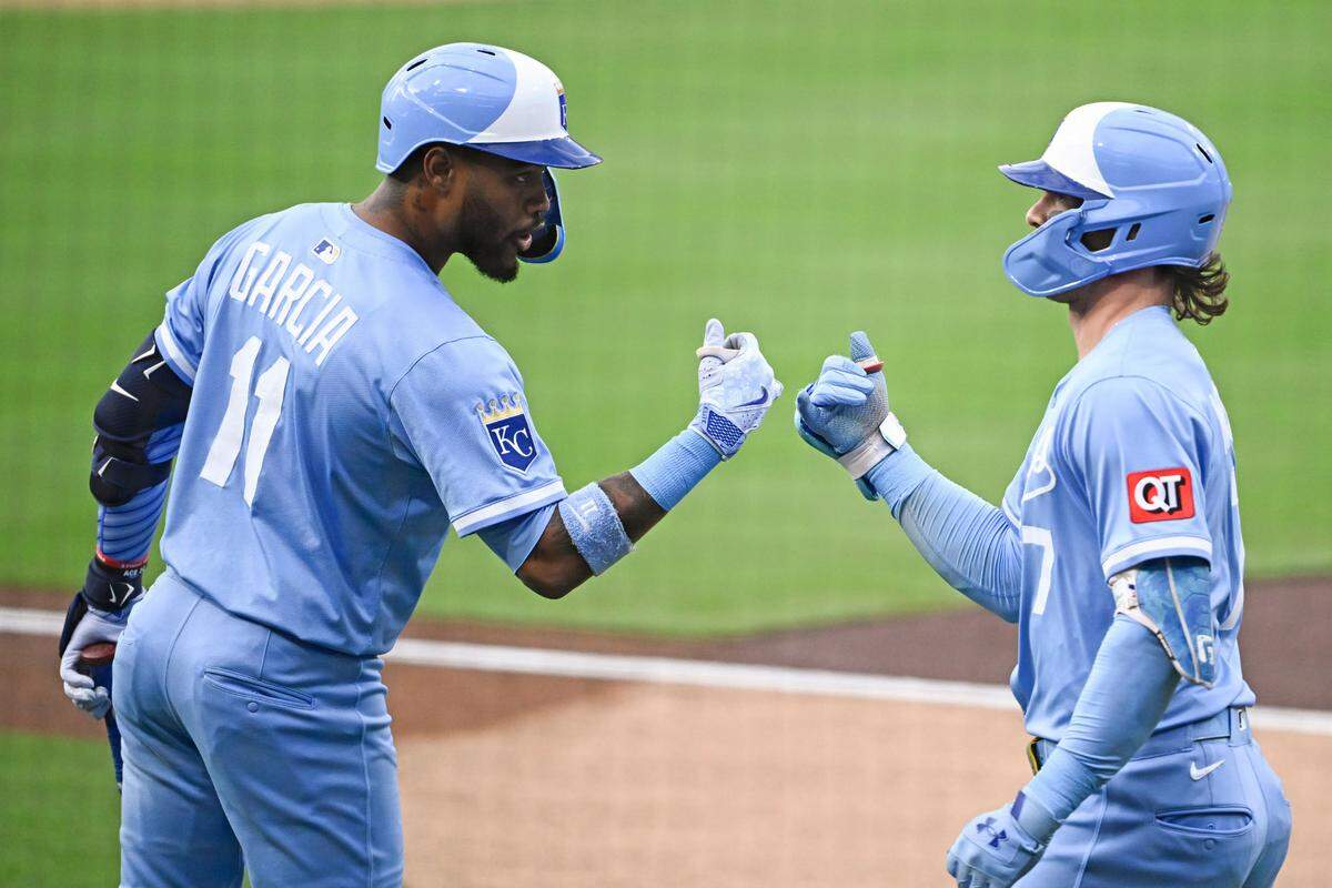 Kansas City Royals shortstop Bobby Witt Jr. (7) is congratulated by Maikel Garcia (11) after hitting a solo home run during the first inning against the against the against the San Diego Padres at Petco Park on Jun 20, 2025 in San Diego, California, USA.