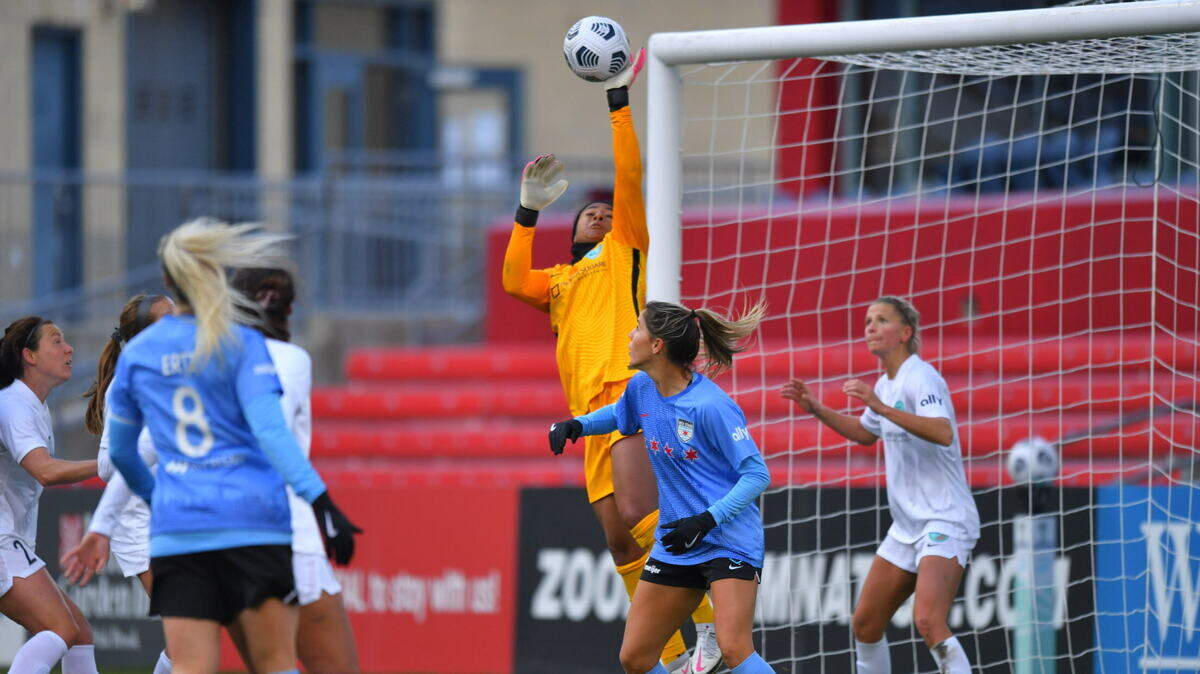 Kansas City NWSL goalkeeper Abby Smith punches away a Chicago Red Stars shot during the first half of the teams’ game on April 21, 2021 at Chicago’s SeatGeek Stadium.