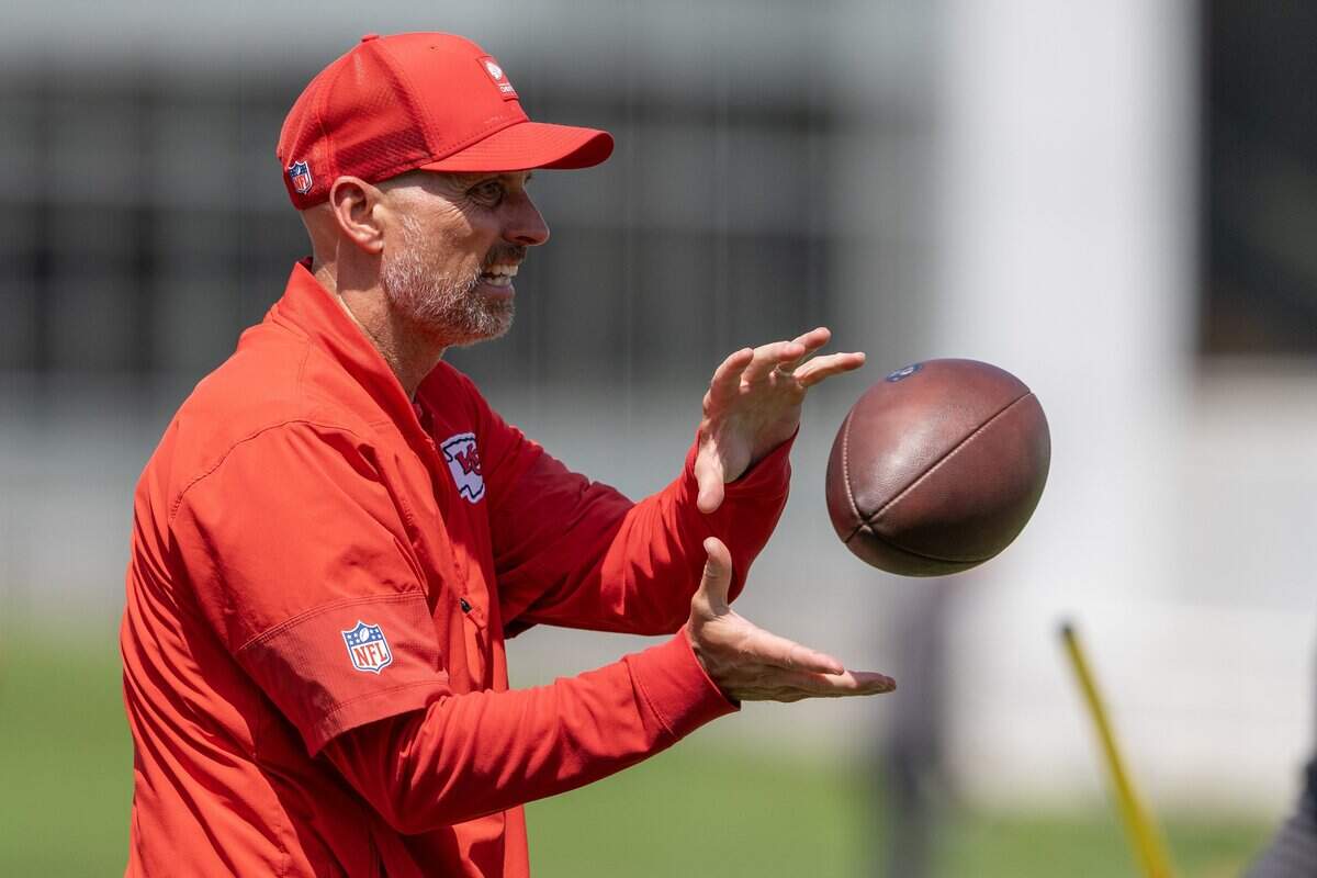 Kansas City Chiefs receivers coach Chad O'Shea gives players direction during minicamp practice at the Chiefs' practice facility on Wednesday, June 10, 2026, in Kansas City.