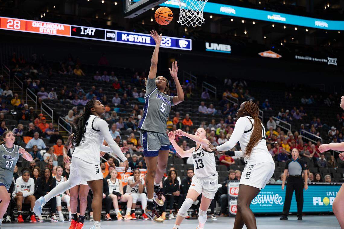 Kansas State Wildcats guard Aniya' Foy (5) goes up for a layup against Oklahoma State during the third round of the Big 12 Women’s Basketball Tournament at the T-Mobile Center.