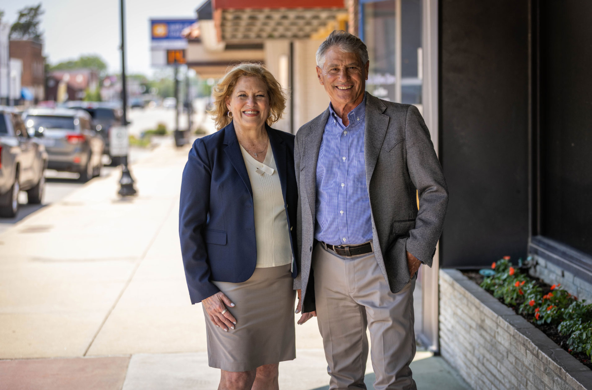 Insurance Commissioner Vicki Schmidt, a Republican candidate for governor of Kansas, stands next to her running mate, former Kansas Farm Bureau President Joe Newland.