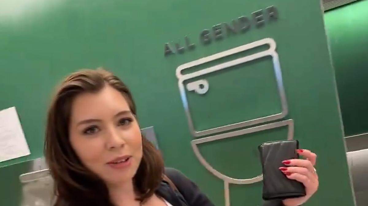 What does she think the restroom on the plane she just got off was?