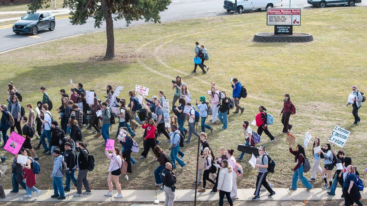 Shawnee Mission North High School students marched in protest of ICE and the Trump administration's policies along on Wednesday, February 11, 2026, in Overland Park.