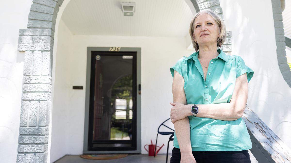 Missouri’s new gerrymandered voting map has left lingering questions among some Kansas City residents, including Jennifer Roe, who is pictured on the front step of her home on Wednesday, May 13.