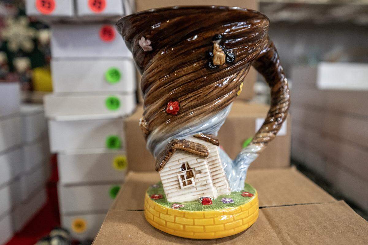 A ceramic mug featuring a tornado scene from The Wizard of Oz, crafted by artist Irma Starr, is displayed in her home studio on Thursday, Dec. 11, 2025, in Kansas City.
