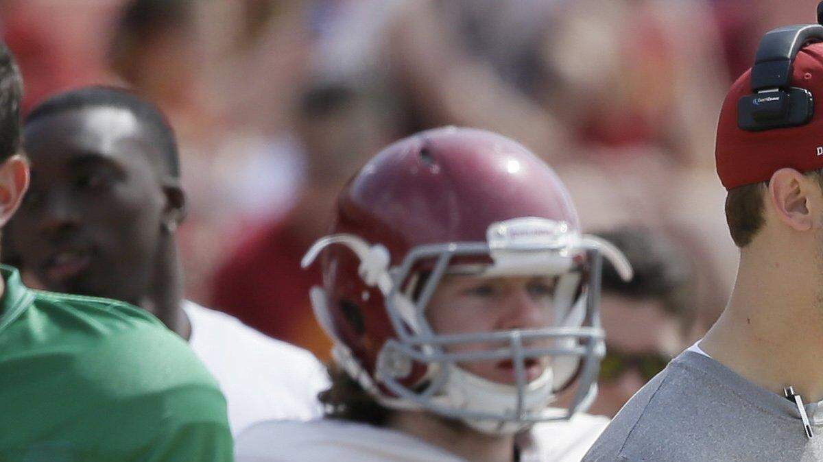 Iowa State offensive coordinator Mark Mangino (center) coaches during Iowa State's annual spring football game April 12 in Ames. 