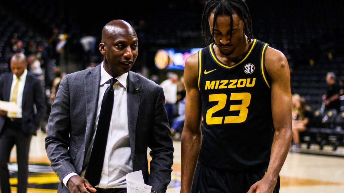 Missouri forward Aidan Shaw and associate head coach Charlton “C.Y.” Young walk off the court after a game against Ole Miss at Mizzou Arena on March 2, 2024, in Columbia.