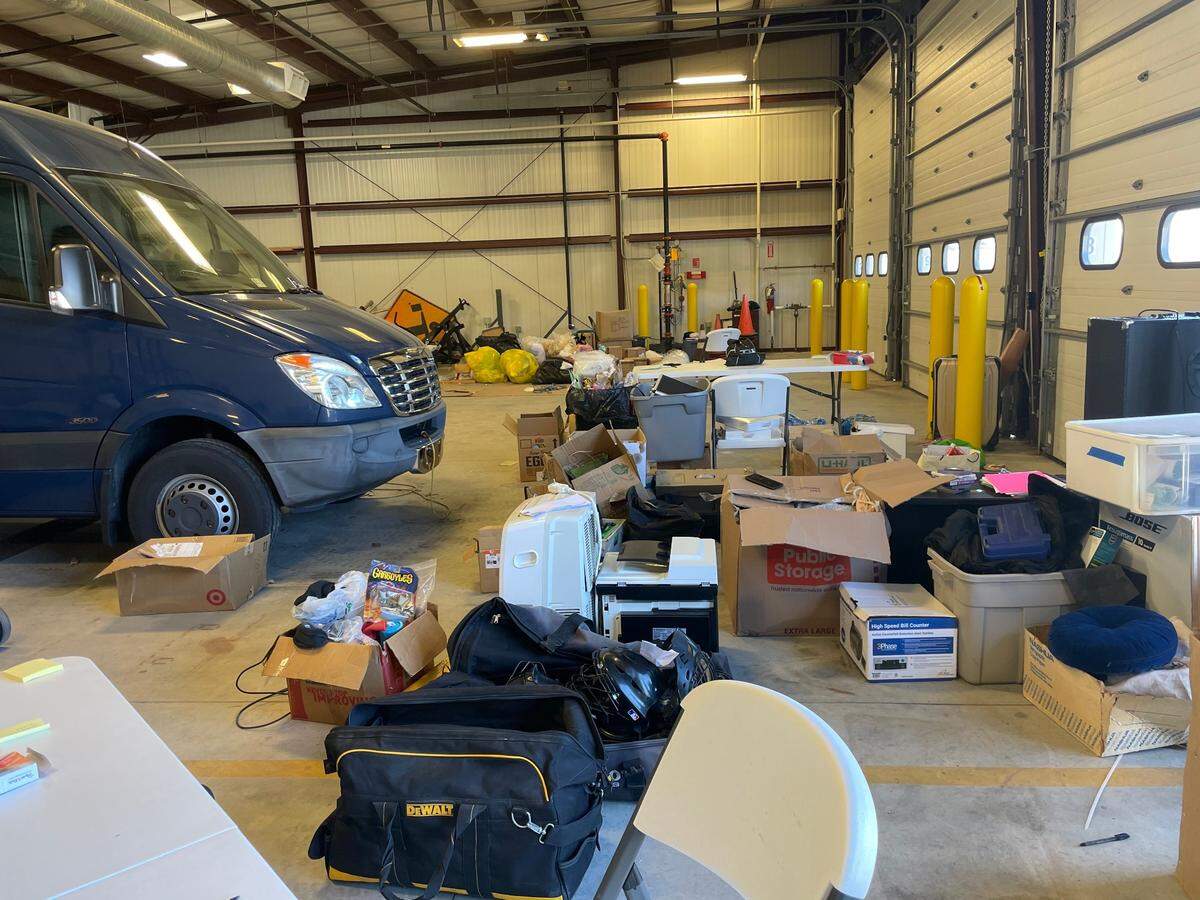 Items were sprawled out in the garage near Kansas City Police Metro Patrol on Thursday.