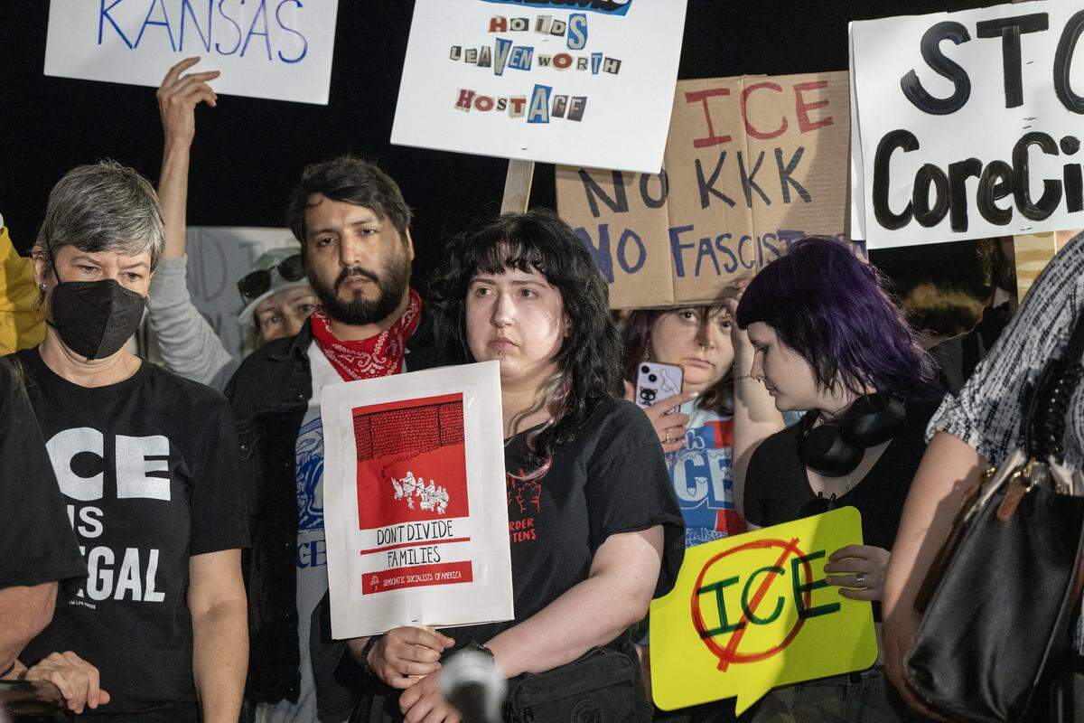 Anti-Ice protesters gathered outside of Leavenworth City Hall after the Leavenworth city commission meeting which approved a zoning permit Tuesday, March 10, 2026, that allows CoreCivic, a private prison company, to reopen its facility as an ICE detention center.