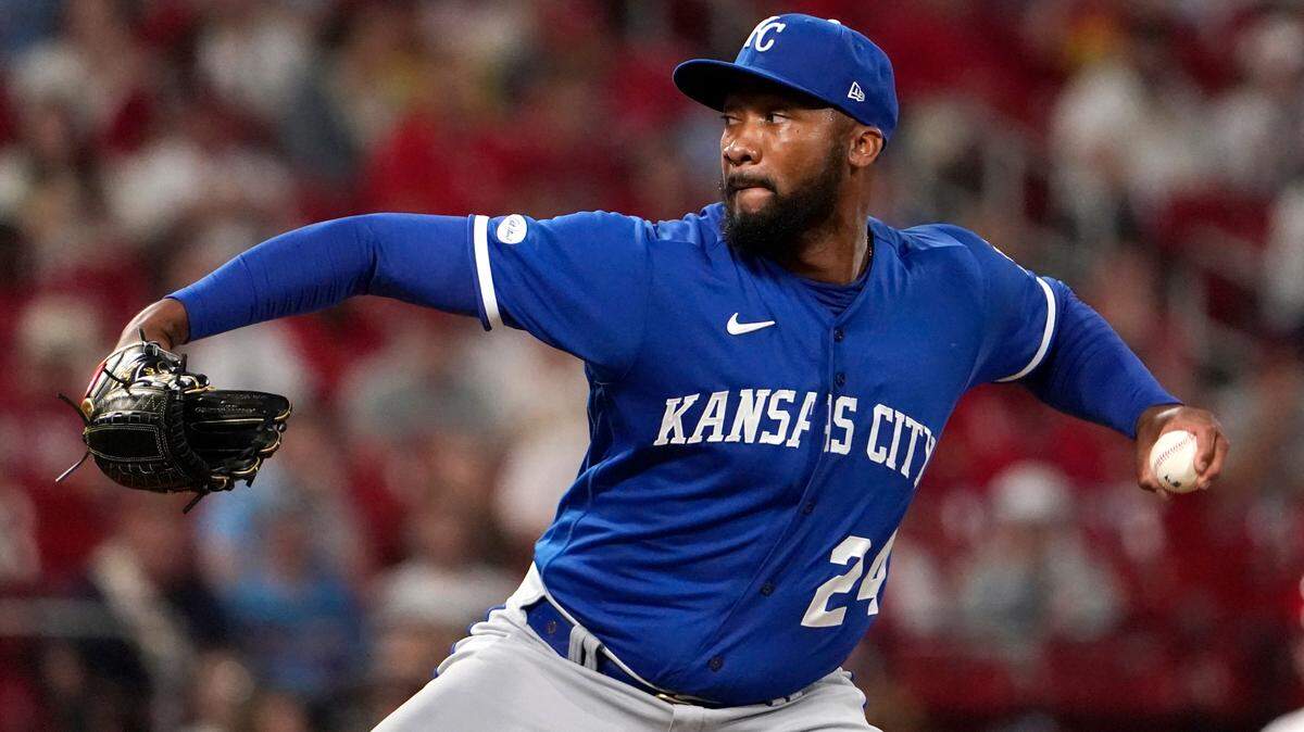 Kansas City Royals relief pitcher Amir Garrett throws during the seventh inning of a baseball game against the Kansas City Royals Tuesday, April 12, 2022, in St. Louis. (AP Photo/Jeff Roberson)