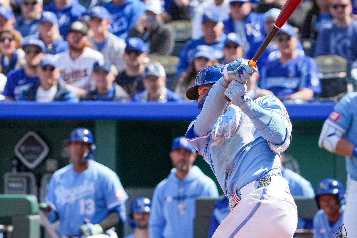 Royals shortstop Bobby Witt Jr. hits a sacrifice fly late in a Thursday, April 10, 2025 Major League Baseball game against the Minnesota Twins at Kauffman Stadium in Kansas City.