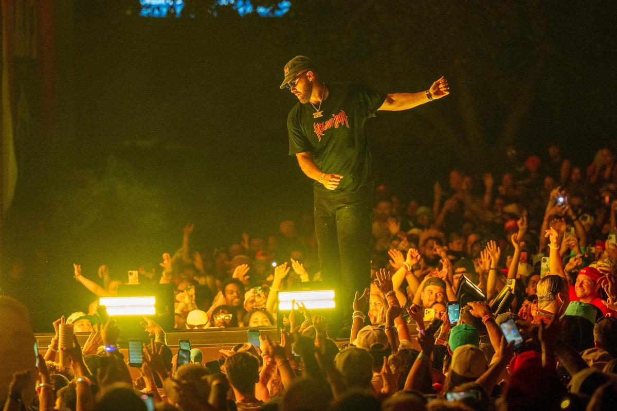 Kansas City Chiefs tight end Travis Kelce dances on stage during Kelce Jam at the Azura Amphitheater on Saturday, May 18, 2024, in Bonner Springs, Kansas.