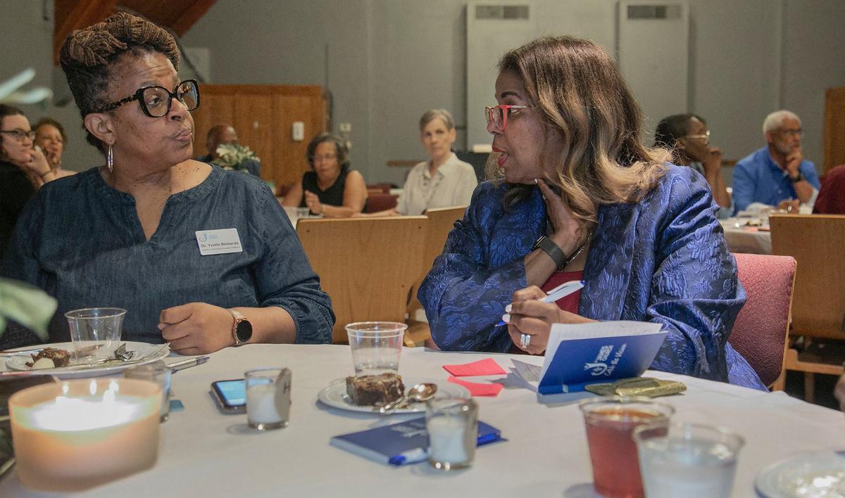 Dr. Yvette Richards, left, and Yvette Walker, opinion editor for The Star, talked Wednesday evening.