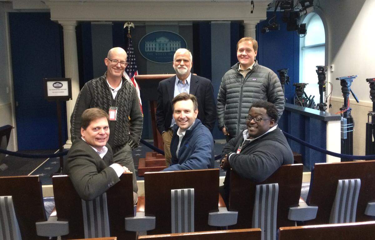 Members of The Star’s sports staff visited with White House Press Secretary Josh Earnest, center, during a trip to D.C. several years ago.