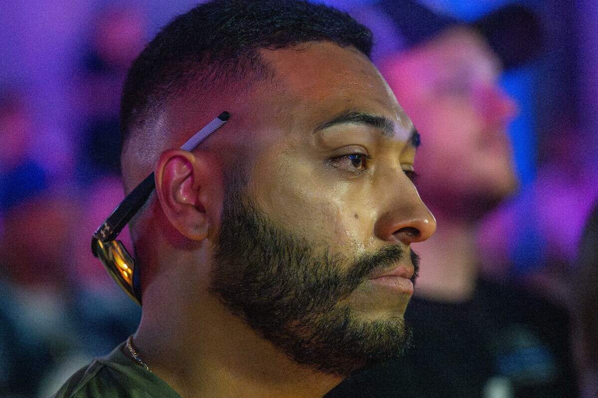 KCK police officer Martin Cervantes sheds a tear at the vigil attended by law enforcement from around the metro area.