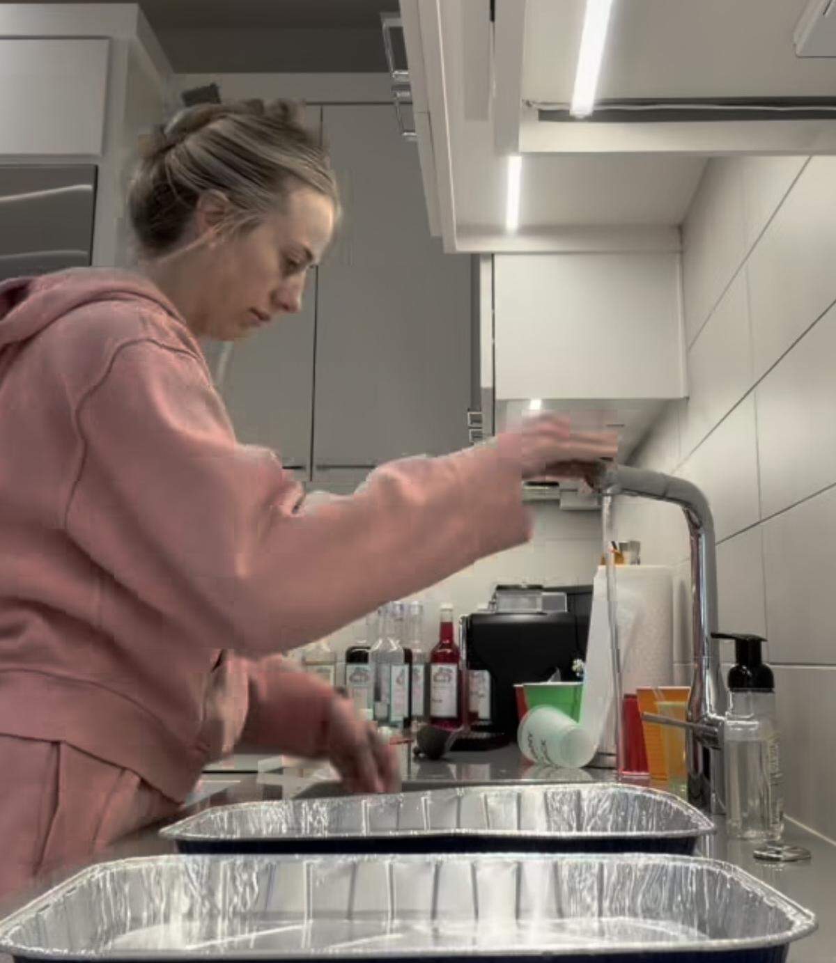 Dozens of foil pans were filled with water.