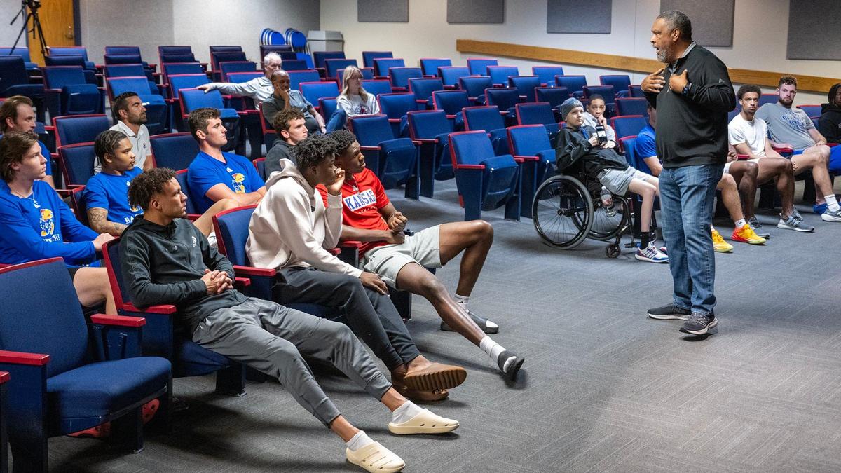 Famed director and screenwriter, Kevin Willmott speaks to the KU Men’s basketball team about the importance of Juneteenth on Wednesday, June 19, 2024, in Lawrence. Willmott, who won an Academy Award in 2019, is a professor in the Film & Media Studies program at KU.