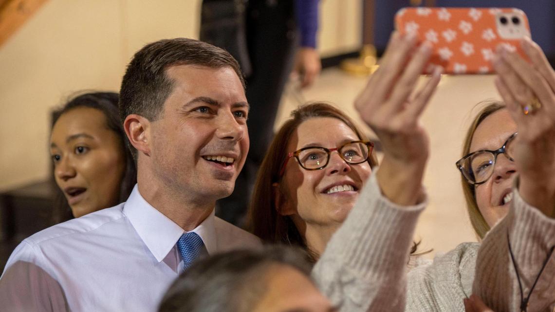 U.S. Transportation Secretary Pete Buttigieg took photos with supporters after speaking at the Get Out The Vote rally in support of Kansas Democrats Wednesday at the United Auto Workers Local 31 Hall in Kansas City, Kansas.