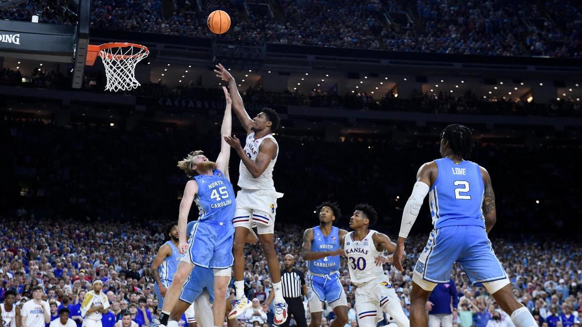 KU’s David McCormack iced the game with this shot over UNC’s Brady Manek during the second half of Monday night’s NCAA championship game at the Superdome in New Orleans. KU beat North Carolina, 72-69.