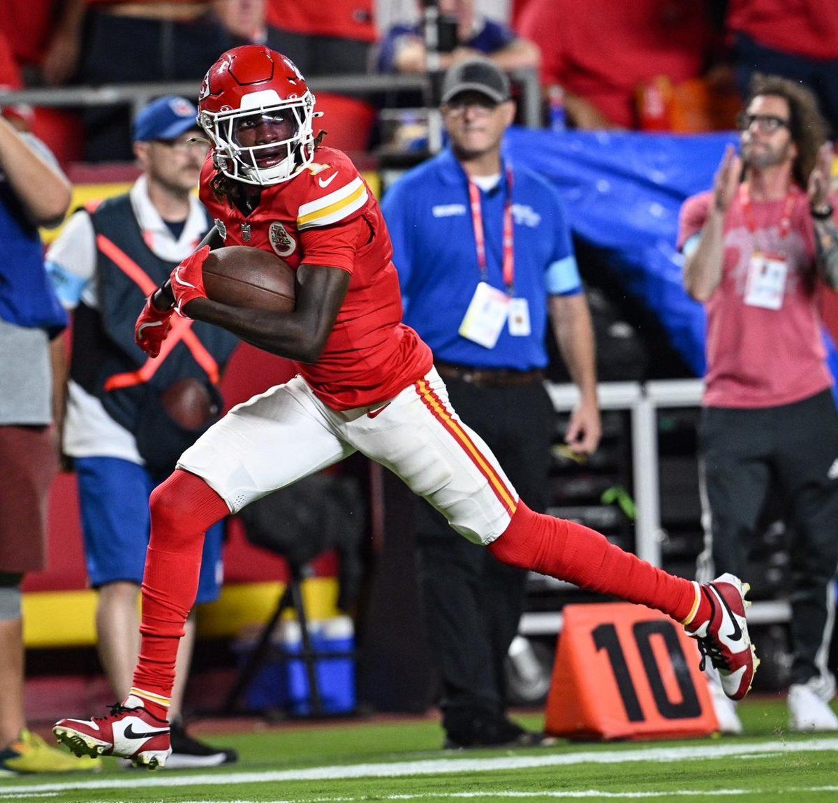 Kansas City Chiefs wide receiver Xavier Worthy runs in for a touchdown after making a catch in the fourth quarter against the Baltimore Ravens Thursday, Sept. 5, 2024, at GEHA Field at Arrowhead Stadium.