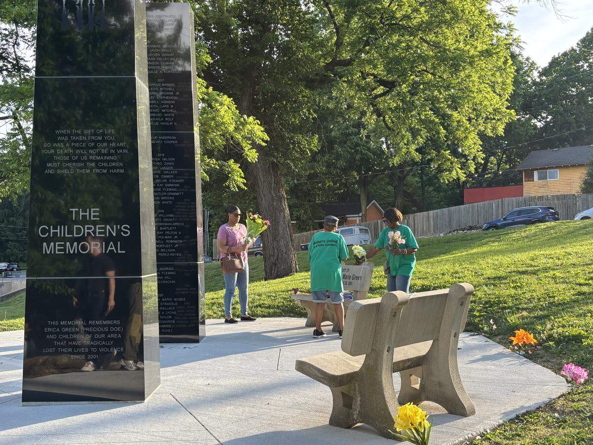 Community members leave flowers at the Children’s Memorial at Hibbs Park on May 15, 2026, on what would have been “Precious Doe” Erica Green’s 29th birthday. Erica was found dead near the park on April 28, 2001.
