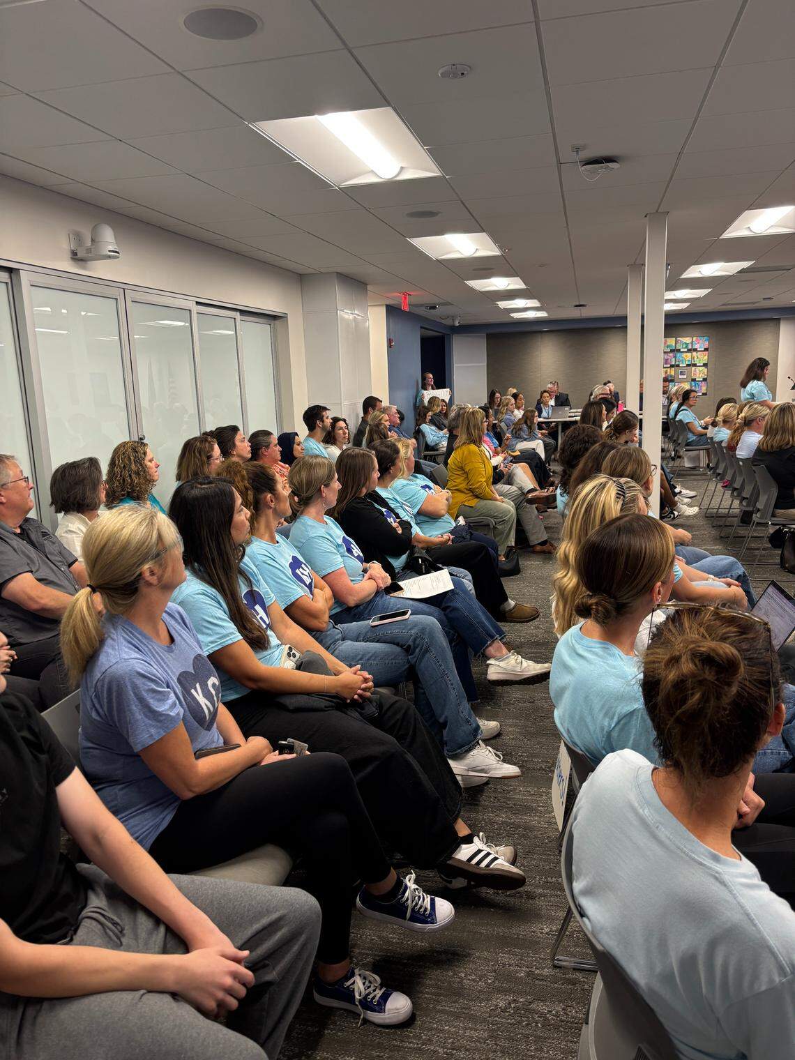 Parents came to the Oct. 13 Blue Valley School Board meeting to advocate for Barbara Hart, a kindergarten teacher who was recently terminated by the district.