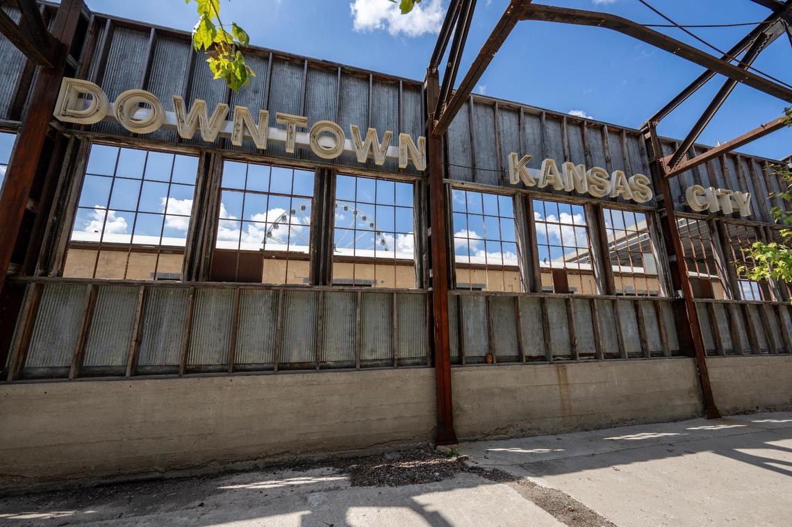 A neon sign reading “Downtown Kansas City” is mounted at Pennway Point inside the old Funkhouser Machinery Co. building. The plan is to turn the 30,000-square-foot indoor/outdoor venue into Talegate Park with a Beef & Bottle restaurant, bars, two kitchen kiosks, an indoor/outdoor beer garden and a mezzanine Funk House club with VIP seating.
