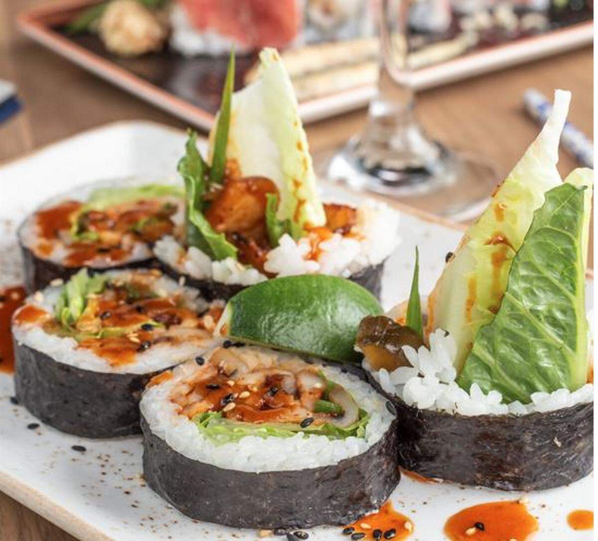 Prime Social’s KC roll with roasted pork belly.