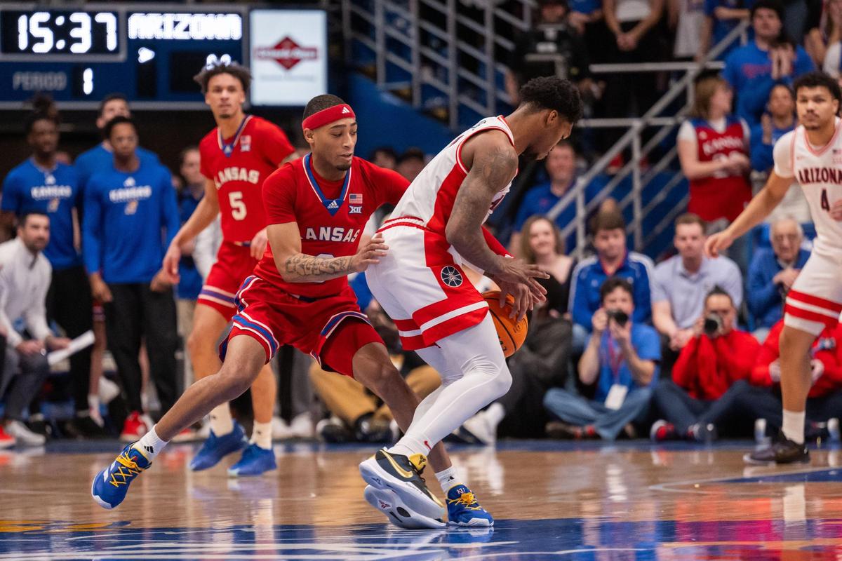 Kansas Jayhawks guard Dajuan Harris strips the ball from an Arizona Wildcats player during the first half of the game vs. the Arizona Wildcats on Saturday, March 8, 2025, at Allen Fieldhouse.