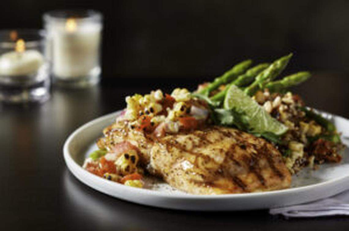 Firebirds’ wood-grilled, honey-chile glazed salmon.