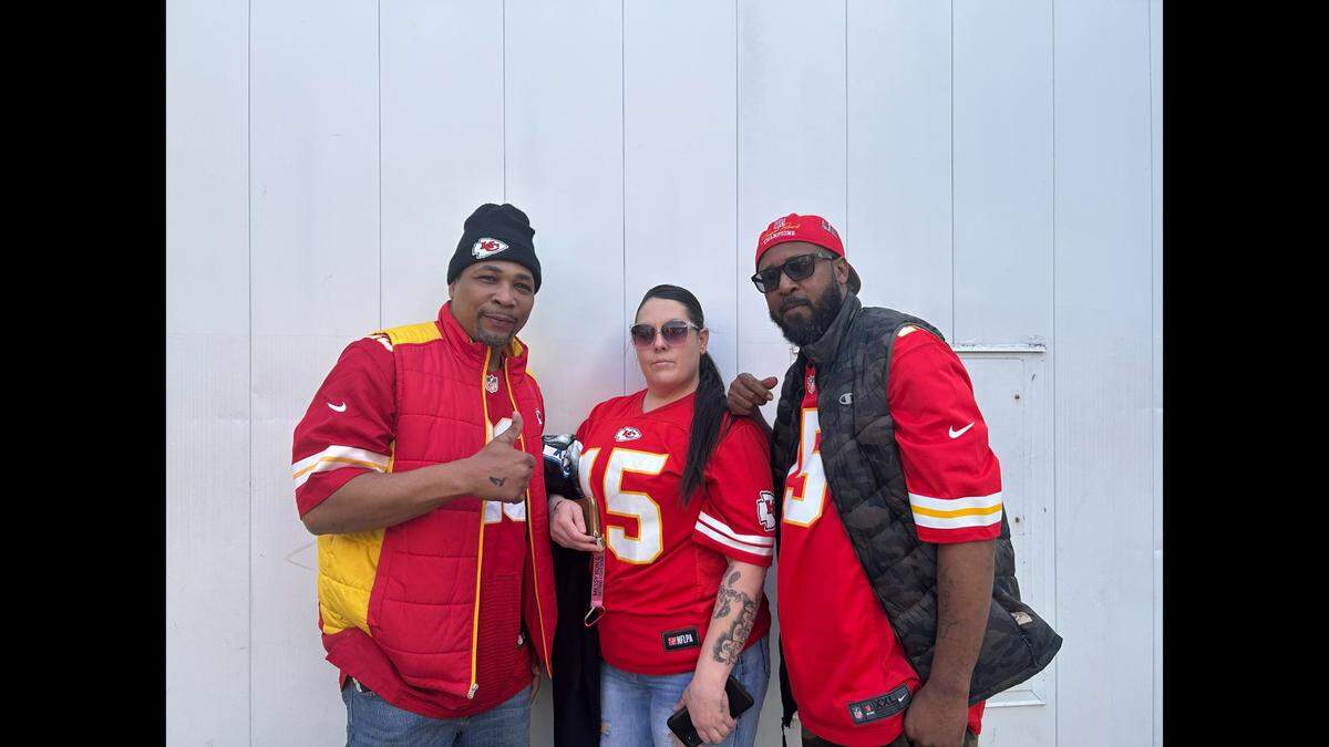 Londell Johnson, left, and Tama Bush, right, with Marci Abernathy.