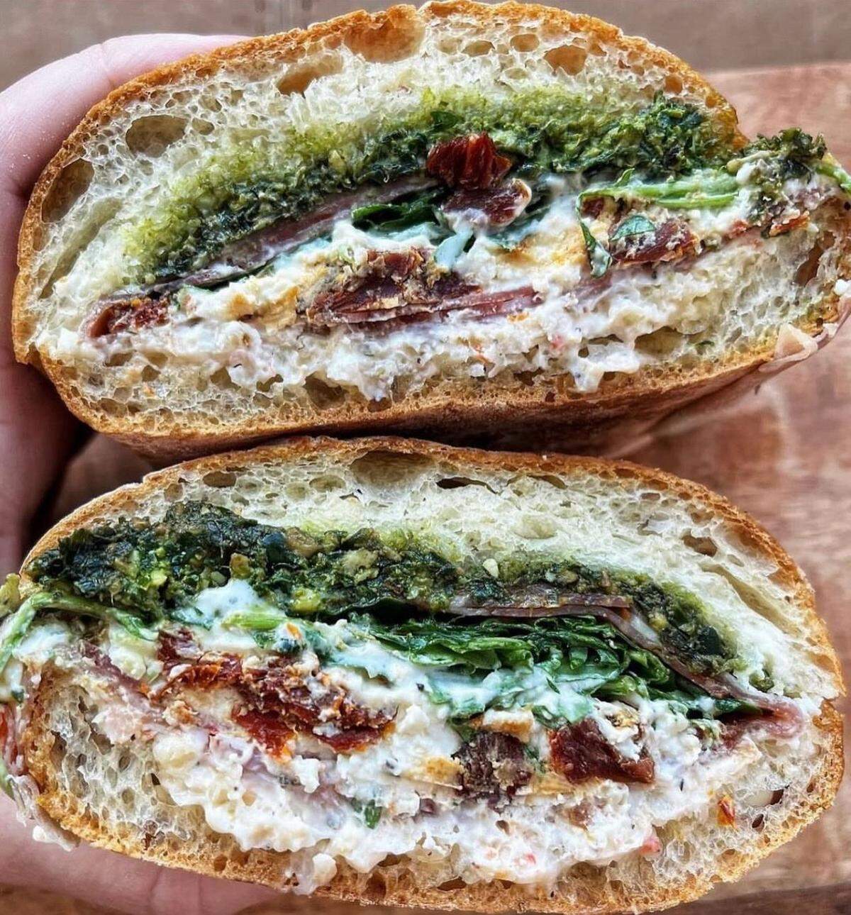 The Sublime (prosciutto, hot soppressata, burrata, fresh walnut pesto, spicy garlic aioli, sun-dried tomatoes and arugula) is one of 18 sandwiches that will be served at La Fetta in Overland Park.
