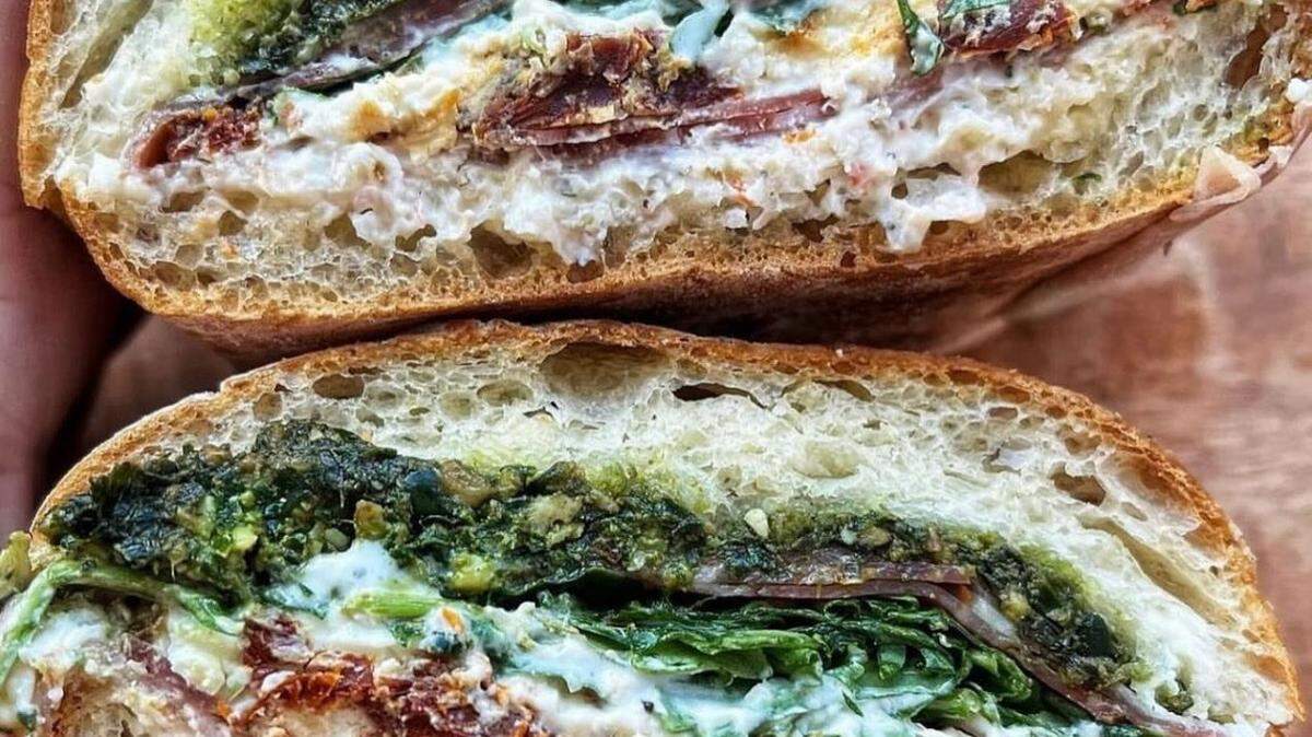 The Sublime (prosciutto, hot soppressata, burrata, fresh walnut pesto, spicy garlic aioli, sun-dried tomatoes and arugula) is one of 18 sandwiches that will be served at La Fetta in Overland Park.
