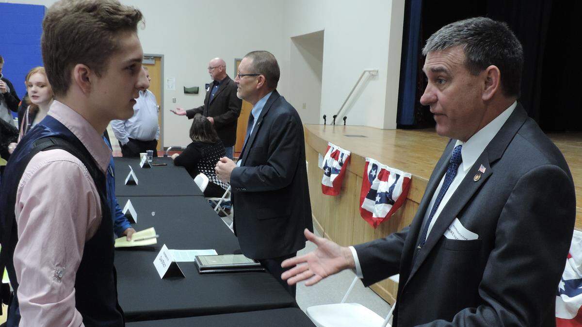 Summit Christian Academy junior Brandon Self visited with State Rep. Mike Haffner at the school’s second annual legislative breakfast.