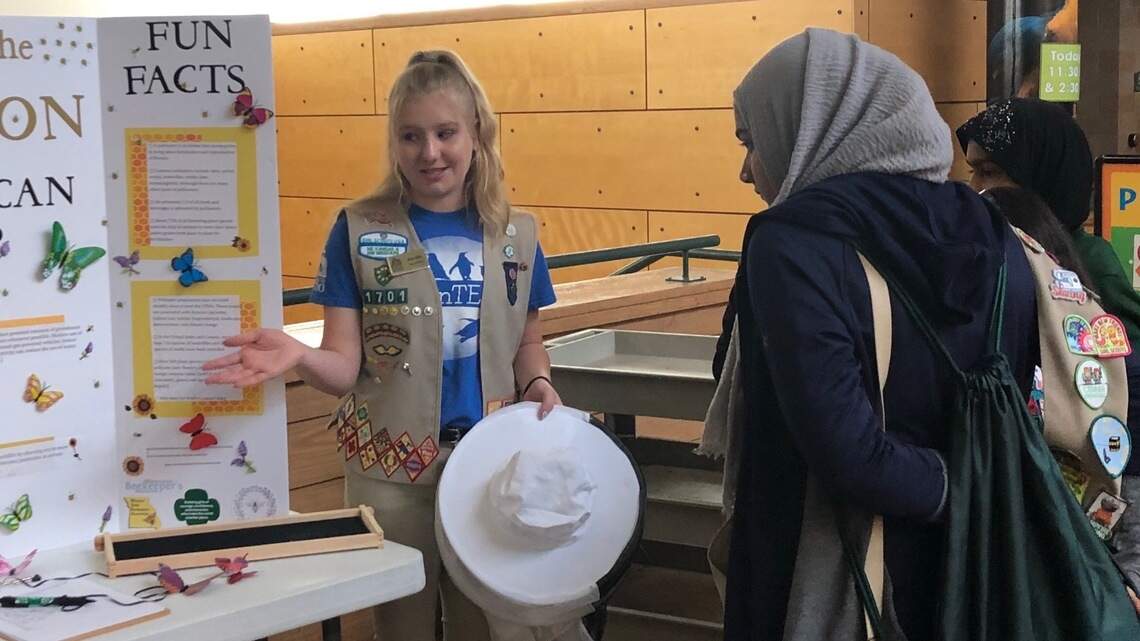 Ray-Pec High teen ‘queen bee’ with Girl Scouts after teaching public about pollinators