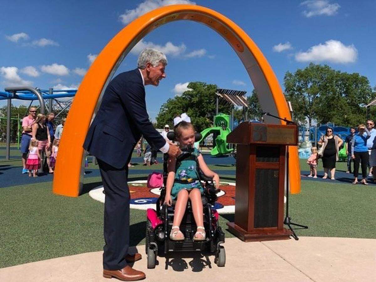Olivia Bloomfield at the 2018 opening of an accessible playground that she championed for in Salina, Kansas.  It was named Olivia's Playground in her honor. 