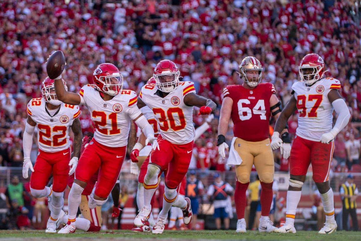 Rookie Kansas City Chiefs safety Jaden Hicks (No. 21) celebrates after intercepting San Francisco 49ers quarterback Brock Purdy on Sunday at Levi’s Stadium in Santa Clara, Calif.