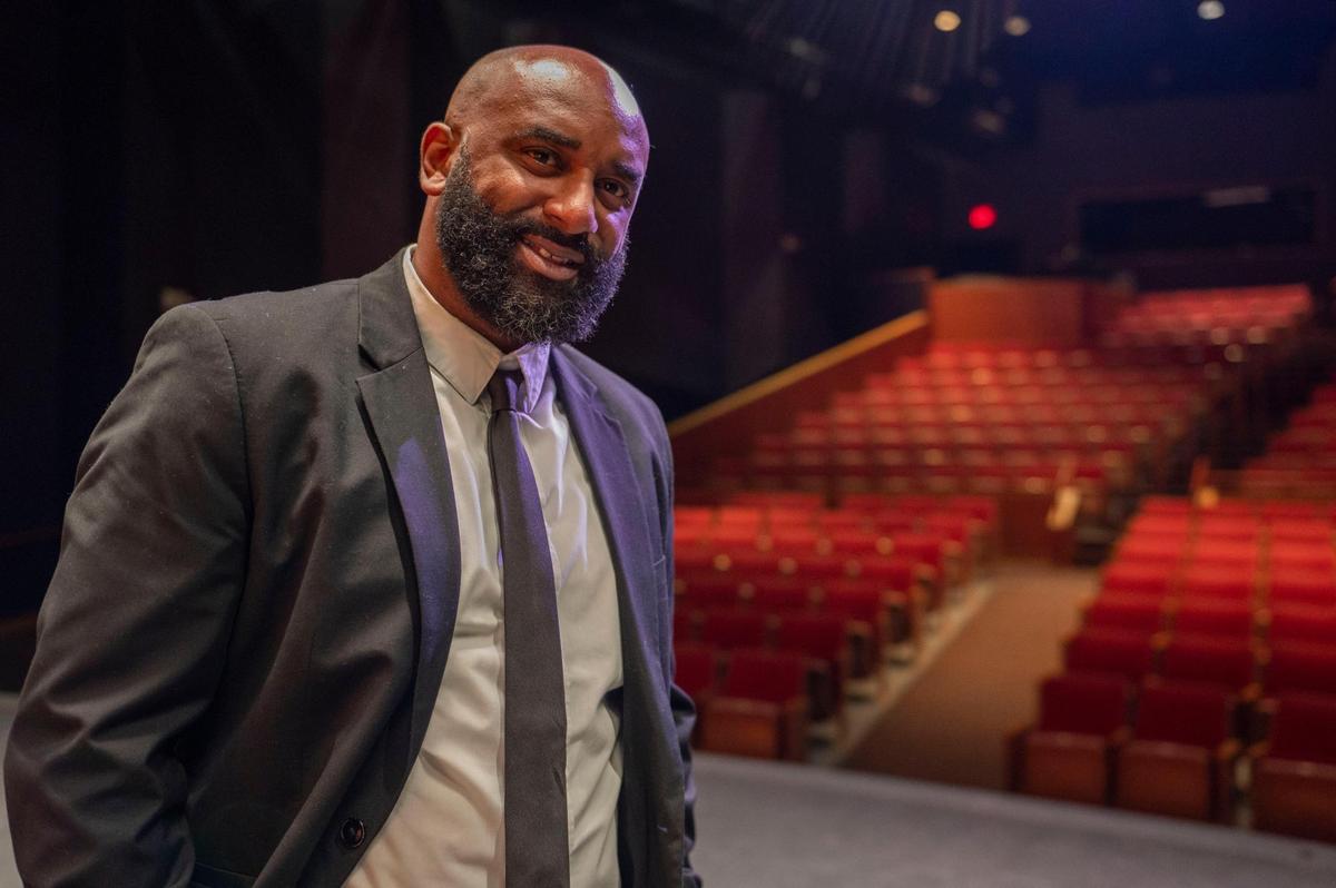 James McGee stands on the main stage of Gem Theater in Kansas City on Tuesday, Feb. 15, 2022. The American Jazz Museum created a position for McGee in an effort to connect Gem Theater and other venues to the broader Kansas City community. McGee hopes to make these older sites relevant and bring people out to live music and events again.