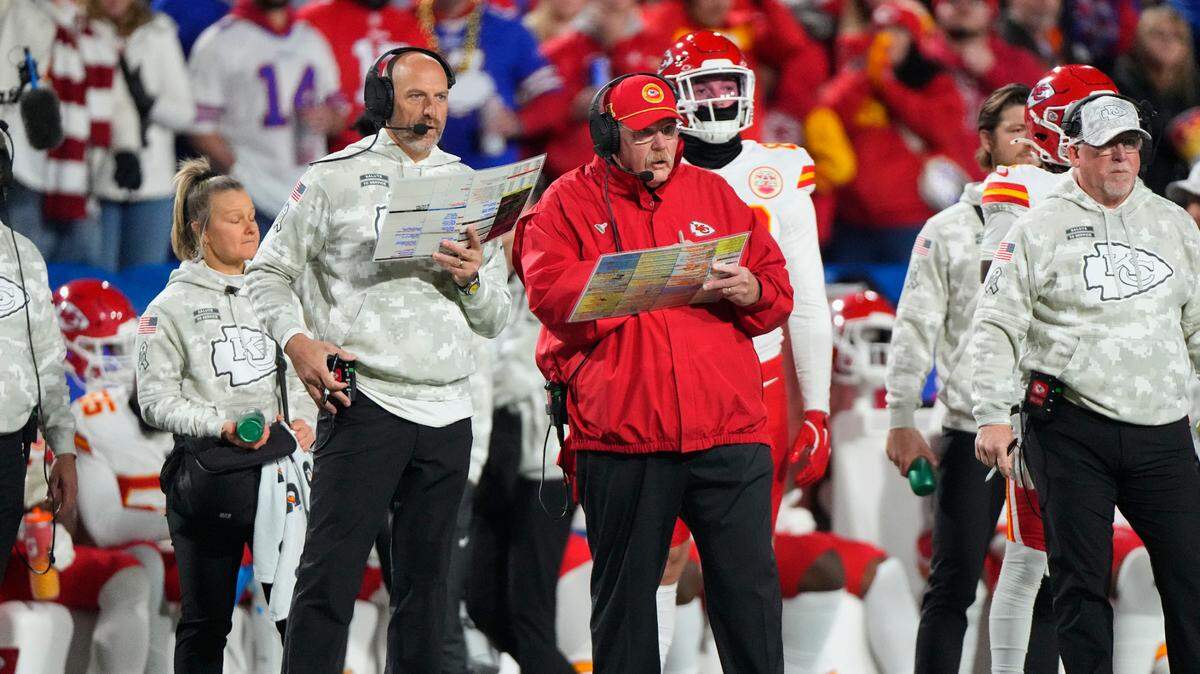 Kansas City Chiefs head coach Andy Reid looks at his play card during the first half against the Buffalo Bills at Highmark Stadium.
