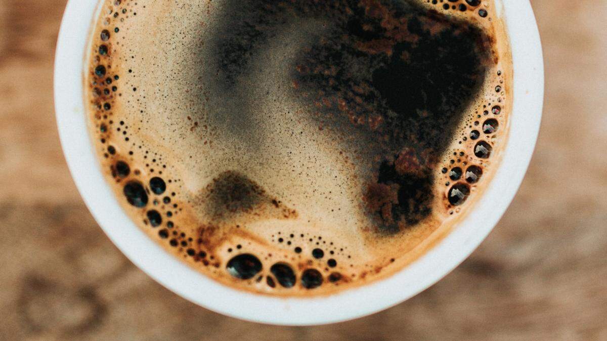 An Oklahoma coffee shop said it unknowingly gave customers cups with vulgar ghost stickers.