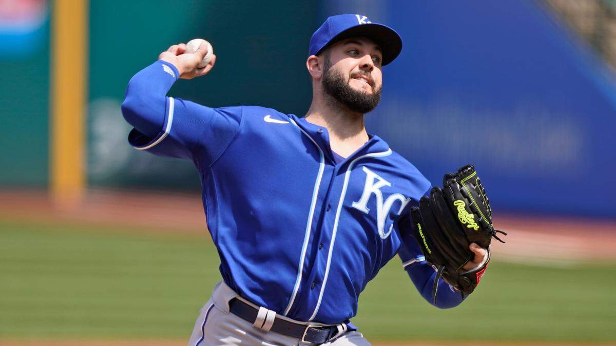 Kansas City Royals starting pitcher Jakob Junis delivers in the first inning of a baseball game against the Cleveland Indians, Wednesday, April 7, 2021, in Cleveland. (AP Photo/Tony Dejak)
