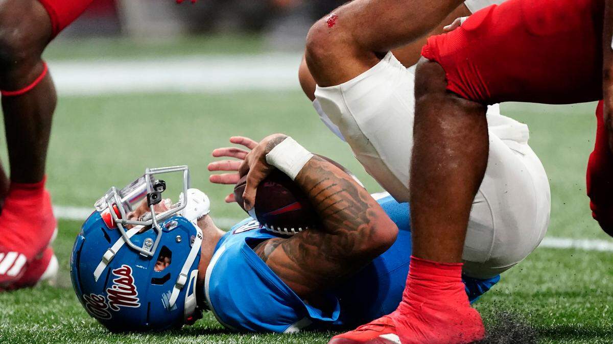 Mississippi quarterback Matt Corral (2) is shown in action during an NCAA college football game against Louisville Monday, Sept. 6, 2021, in Atlanta. (AP Photo/John Bazemore)